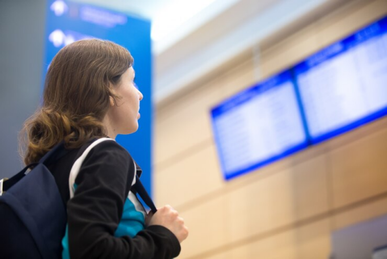 Stock image of a woman inside an airport