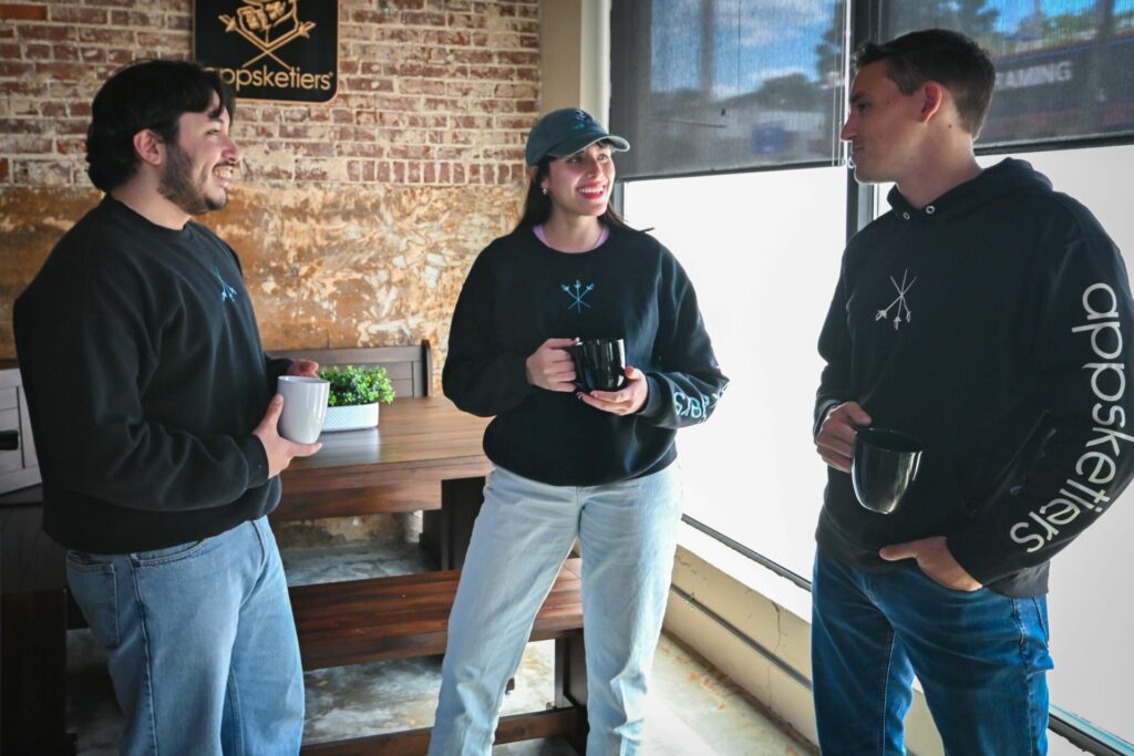 Group of people in an office chatting