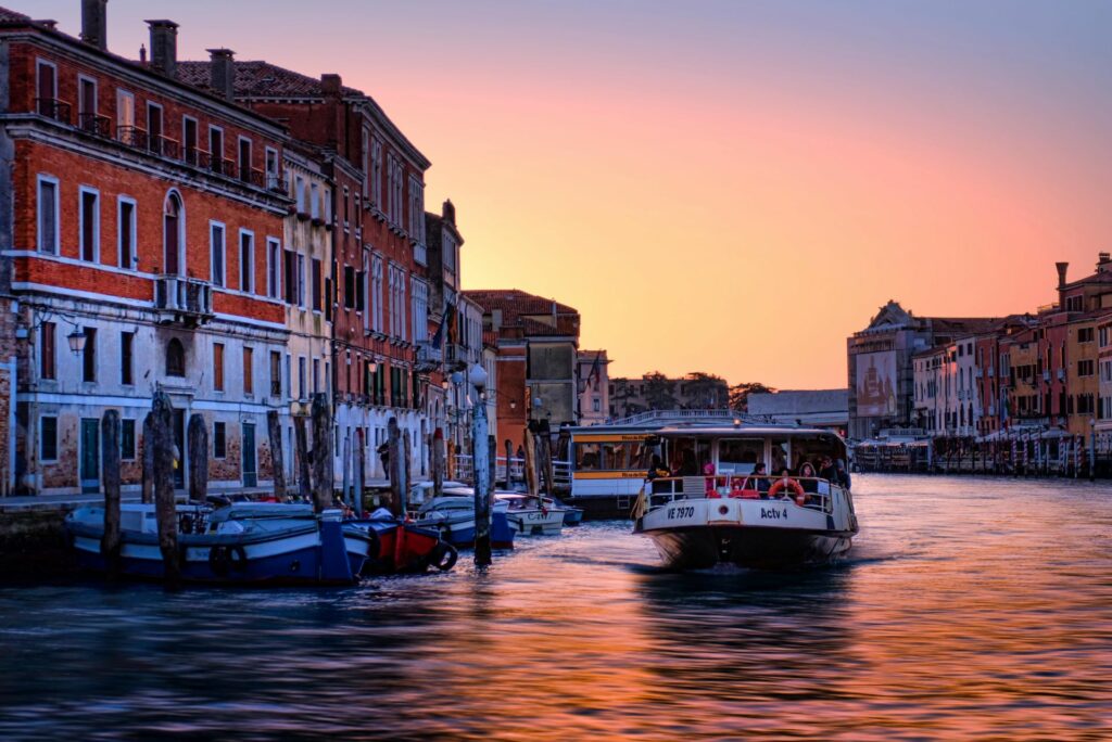 Venice showing a boat on a canal