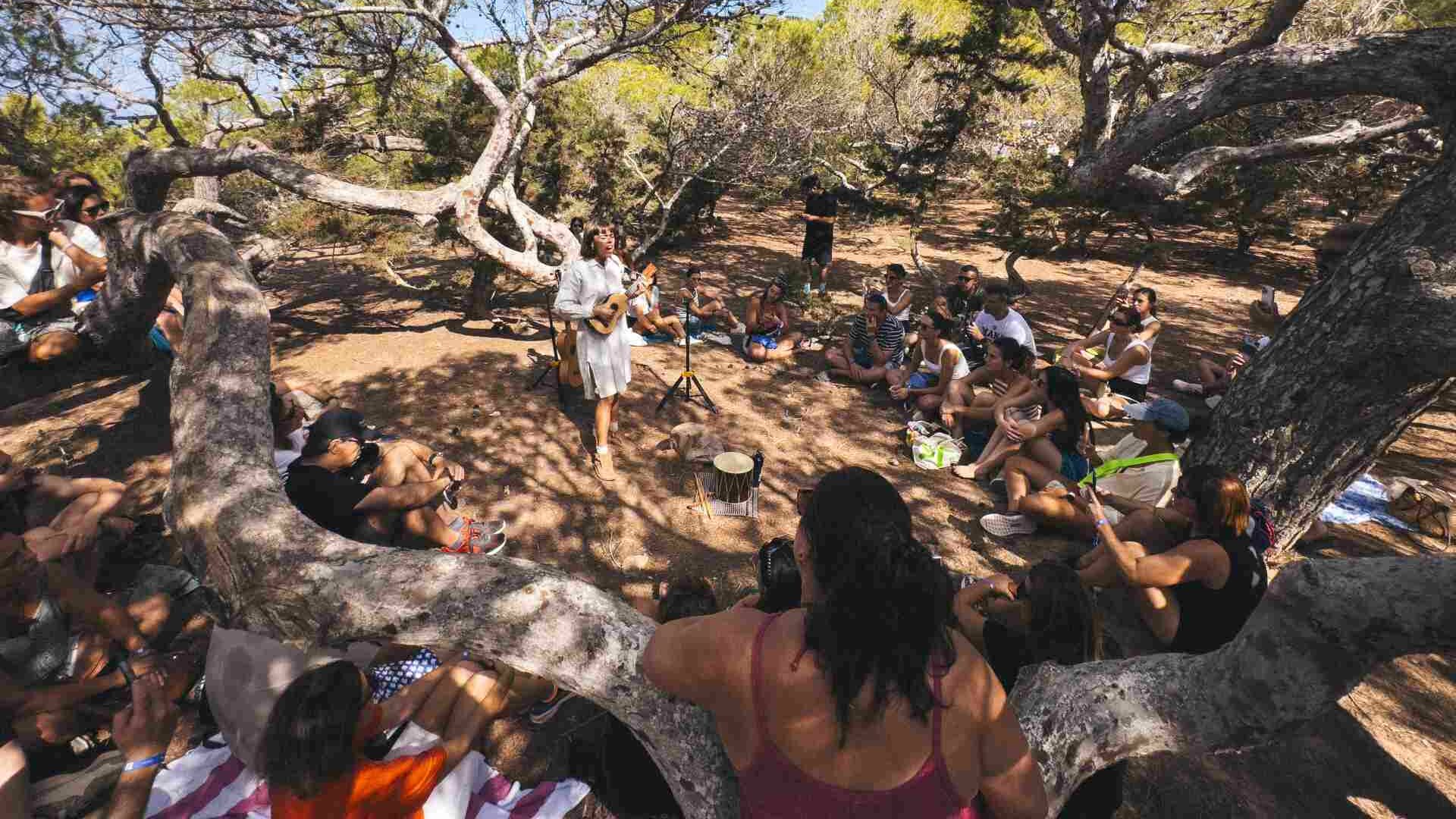 People sitting under a tree